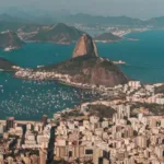 aerial photo rio de janeiro surrounded by sea hills sunlight brazil 1 696x464.jpg