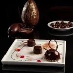 Dacquoise de chocolate e caramelo 05 Pascoa Windsor Marapendi 2026 Alex Souto 696x464 1