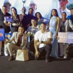 Equipe do Muah Gastrobar comemora no palco o primeiro lugar na categoria Prato Estrela do Sabores da Orla 2026